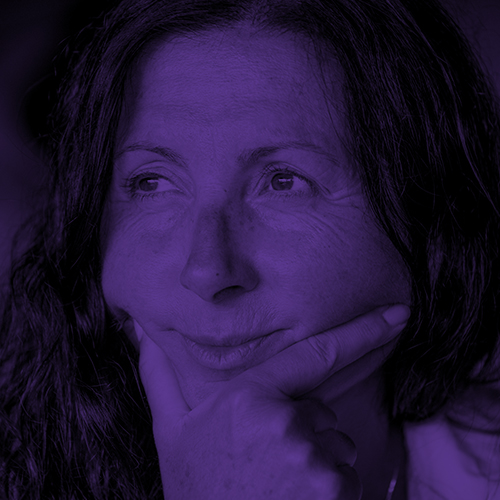 A woman gazes thoughtfully to the side. The image is tinted purple.